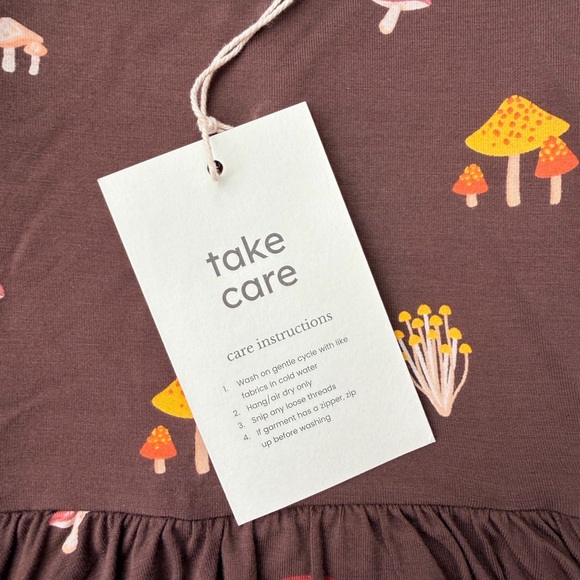 Kyte Baby Long Sleeve Twirl Bodysuit Dress in Brown Mushroom Print - Picture 5 of 12